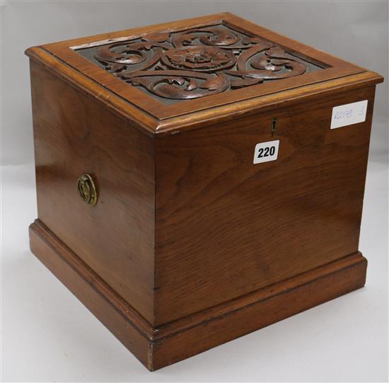 A wooden box, with carved lid